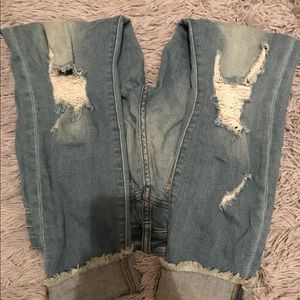 Cropped , cuffed , distressed jeans